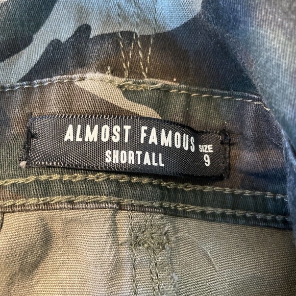 Almost Famous Bib Overall Shorts 9 Green Tan Camo Denim Distressed Shortall - Picture 6 of 8